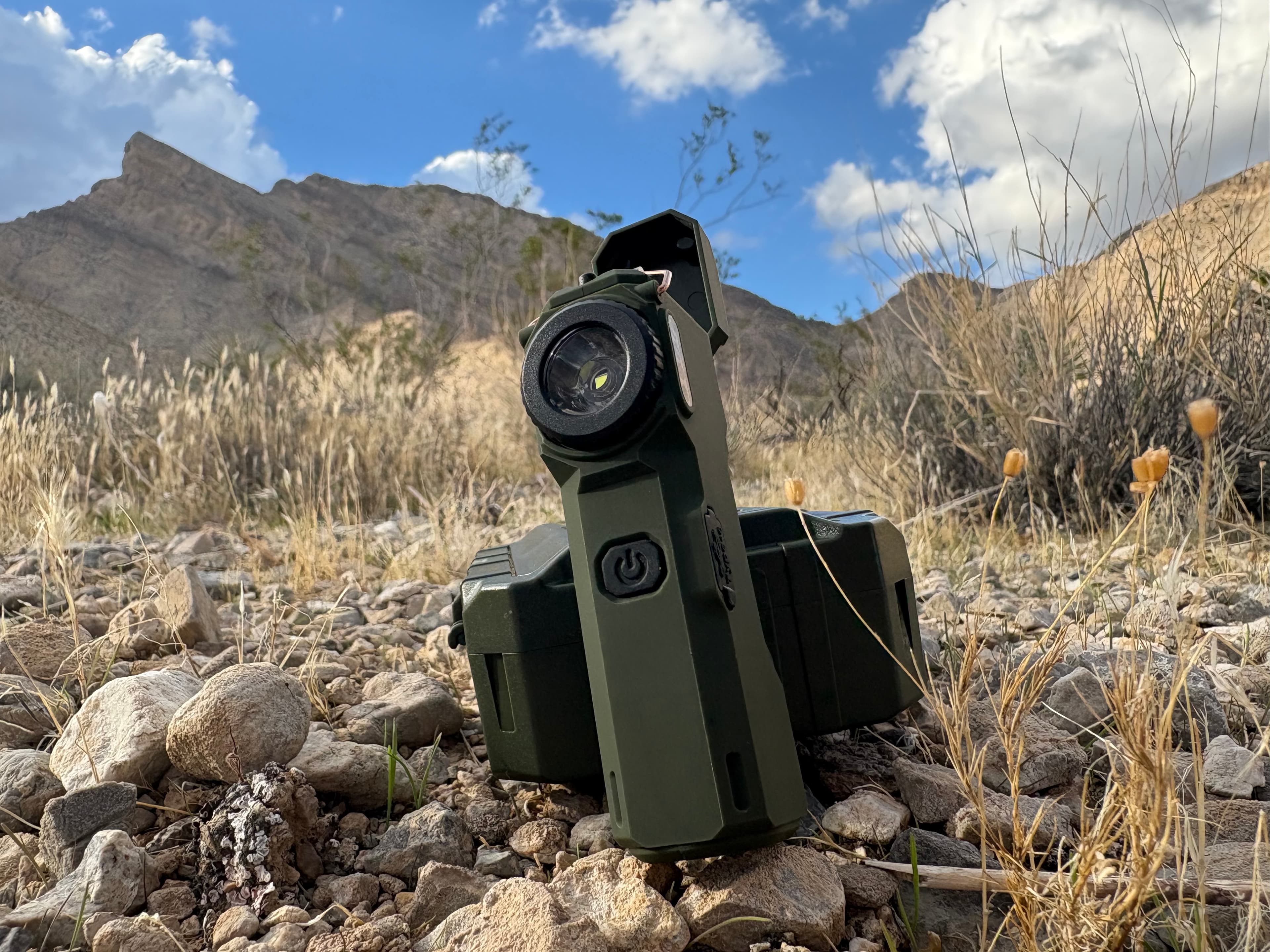 The Arc 80 leaning on its case among rocks